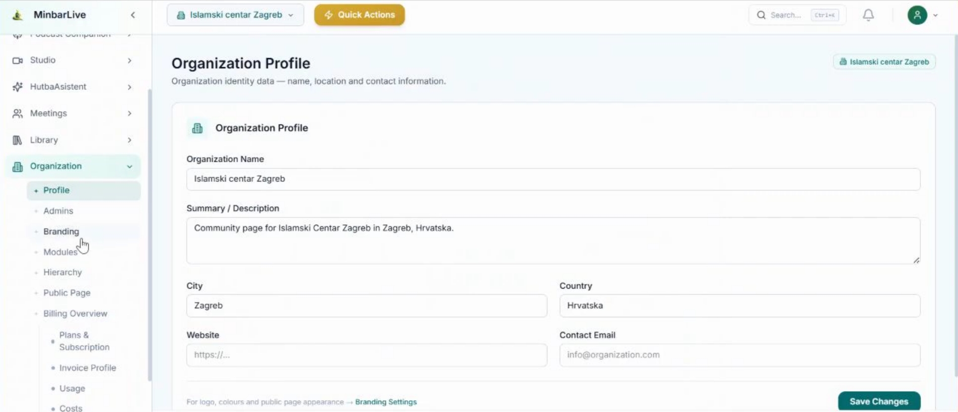 Organization profile screen with name, description, city, country, website, and contact email fields.